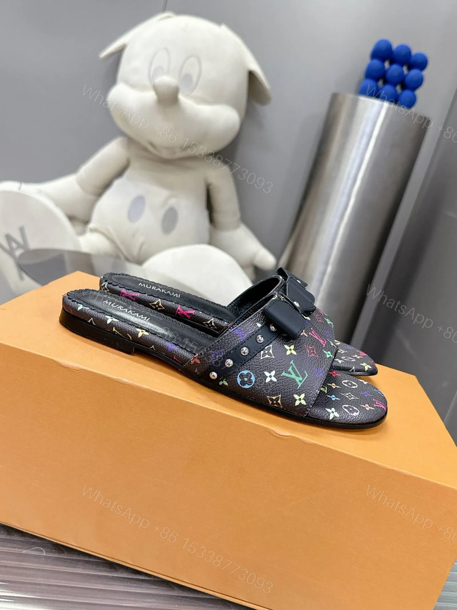View 3 of LV Women Black Patterned Leather Bow Slide Sandals