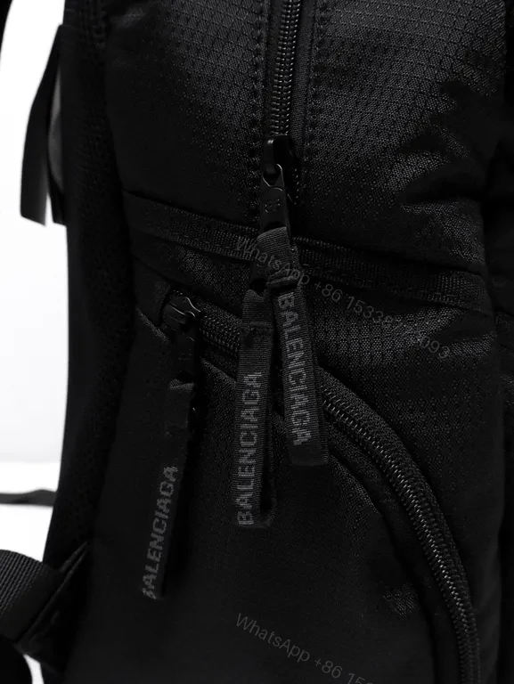 View 2 of Black Nylon Micro Backpack â€” Balenciaga, Minimal Luxury, Compact Daily Carry