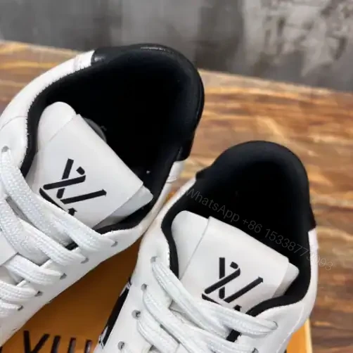 View 4 of LOUIS VUITTON RIVOLI LOW-TOP SNEAKERS IN WHITE AND BLACK – LSVT369