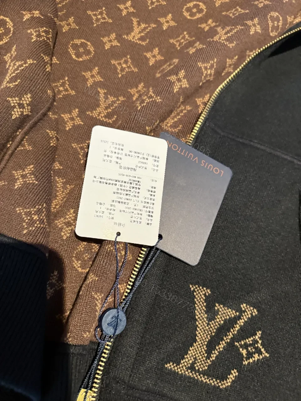View 5 of Black Zip Hoodie: Monogram Detail, Premium Cotton Blend, Versatile Luxury