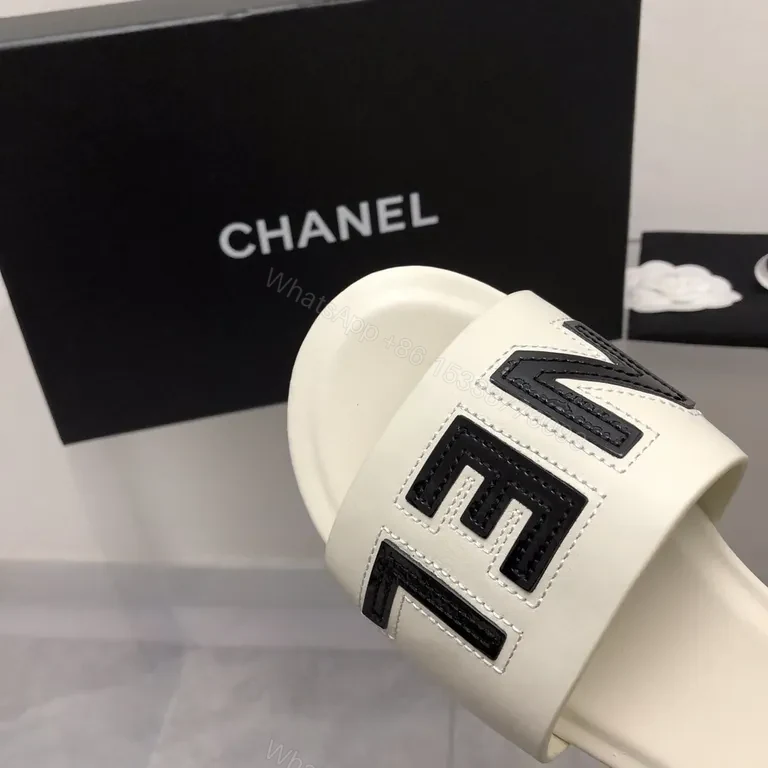 View 8 of Chanel-Inspired White Leather Slides with Bold Logo Strap