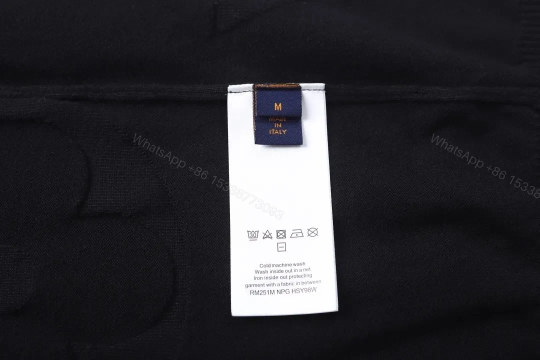 View 9 of Textured Black Knit with Monogram Motif – Luxury Everyday Sweater