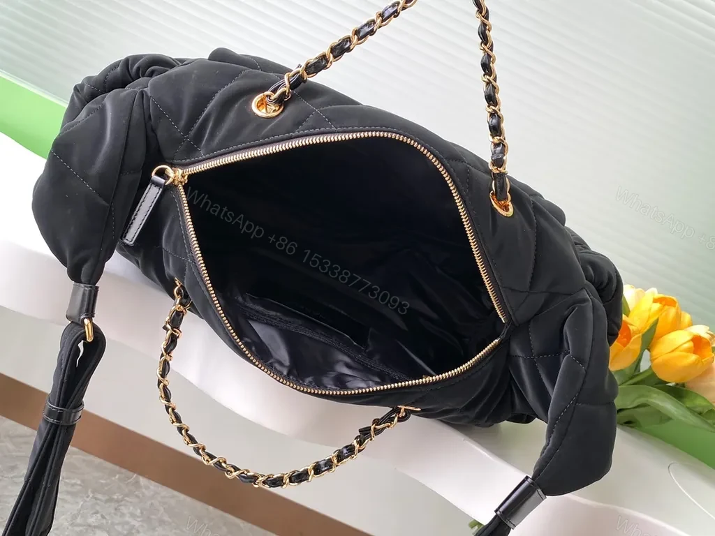 View 5 of Chic Quilted Black Bag with Gold Chain Detail - Compact Luxury