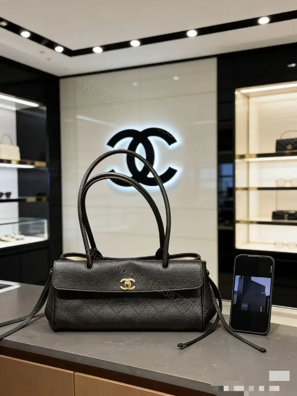 View 4 of Quilted Black Leather Handbag with Gold Hardware Luxury