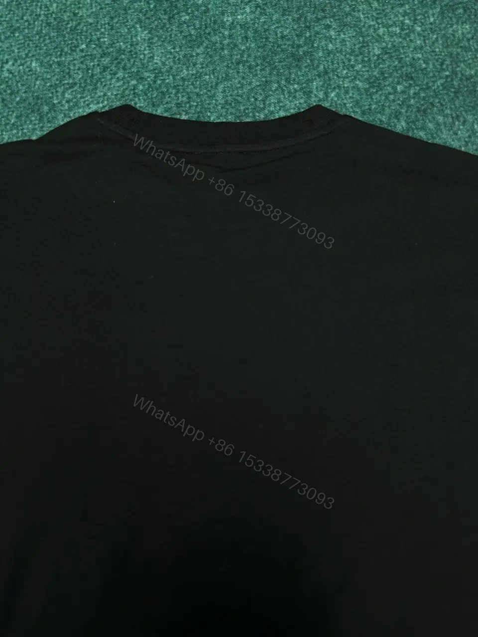 View 11 of Minimalist Black Tee: Crest-Inspired, Elevated Comfort Tee