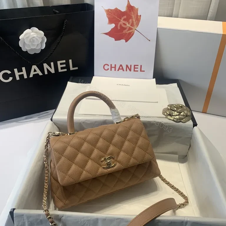 Chic Quilted Tan Leather Handbag with Chain Accent — view 1