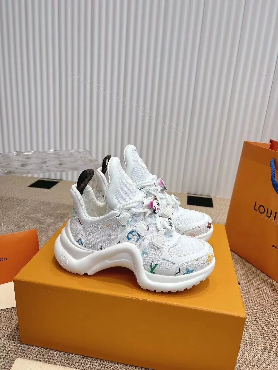 View 4 of LV Women White Mesh Multicolor Logo Sneakers