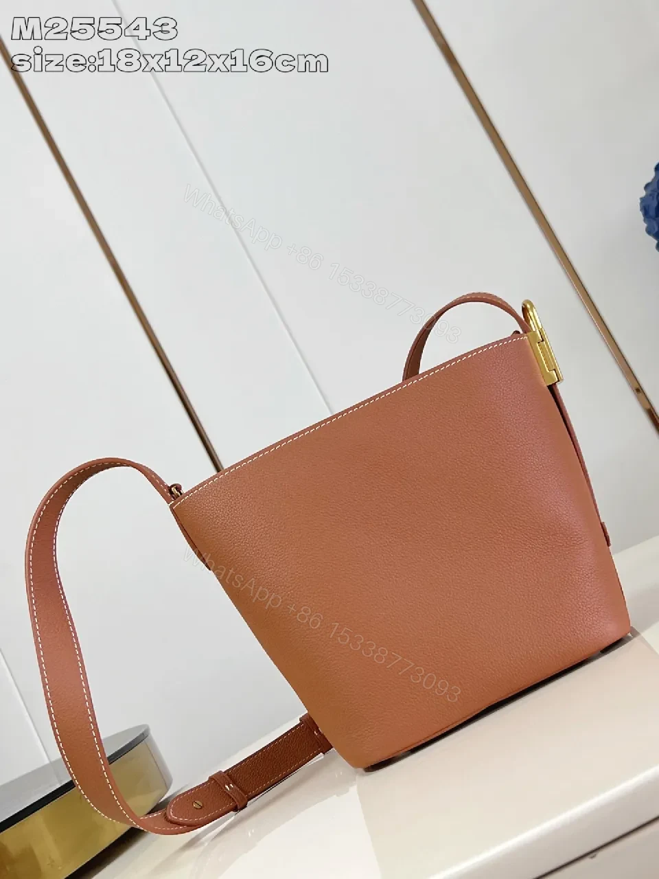 View 3 of Caramel Leather Bucket Bag - Structured, Minimal Hardware, Everyday Luxury