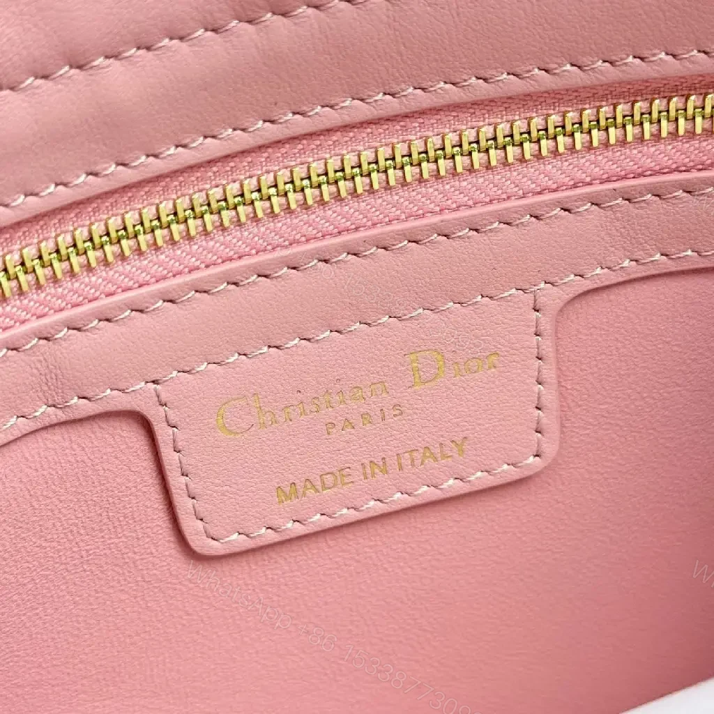 View 4 of Soft Pink Faux-Leather Satchel: Bow Accent, Sculpted Diagonal Panels, Crossbody Comfort