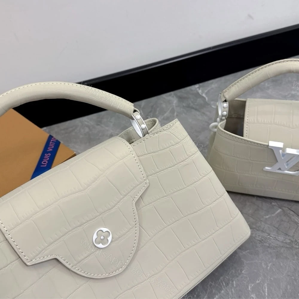 View 5 of Louis Vuitton Capucines MM East West In Grey 33Cm