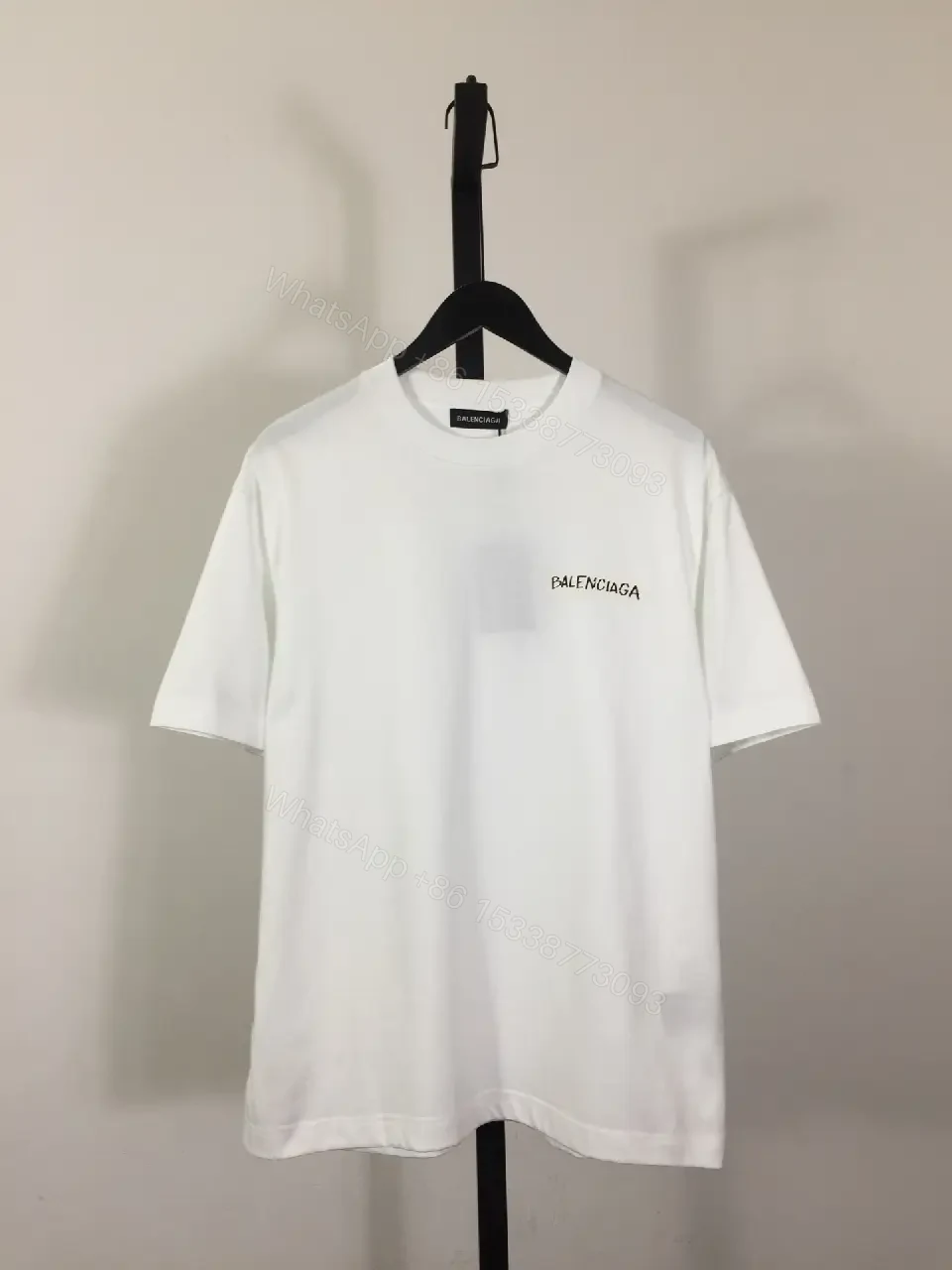 Minimalist White Tee with Luxe Subtle Logo – Modern Essential T-Shirt — view 1