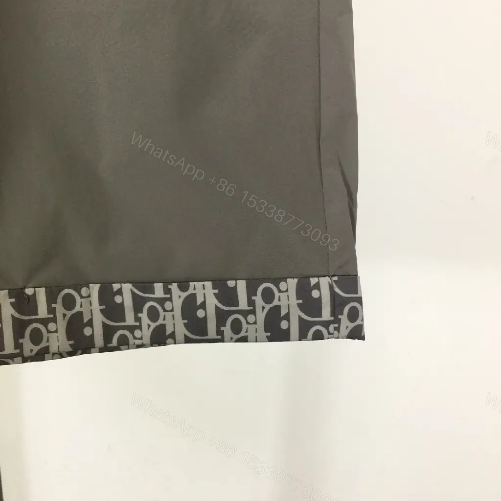 View 5 of Gray Nylon Bermuda Shorts Dior Logo Clip Hem Trim