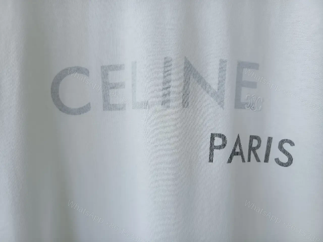 View 8 of Minimalist White Cotton Tee - Relaxed Luxe Comfort