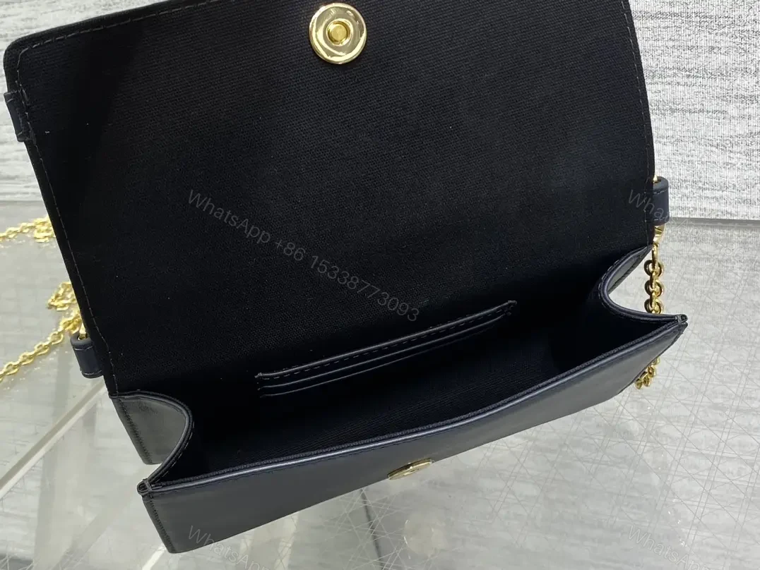 View 5 of Navy monogram canvas leather-trim shoulder bag for everyday luxury