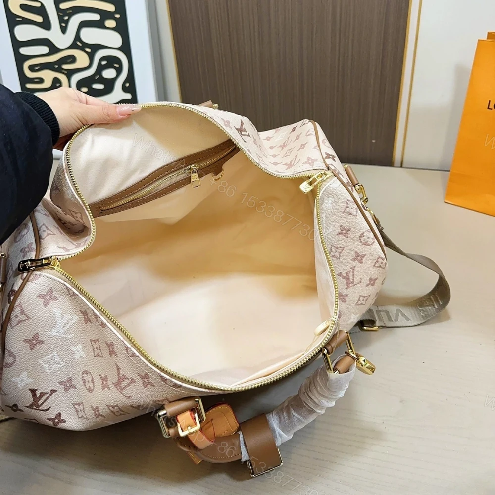 View 8 of Louis Vuitton Keepall Bandoulière 50 Monogram Beige 50Cm