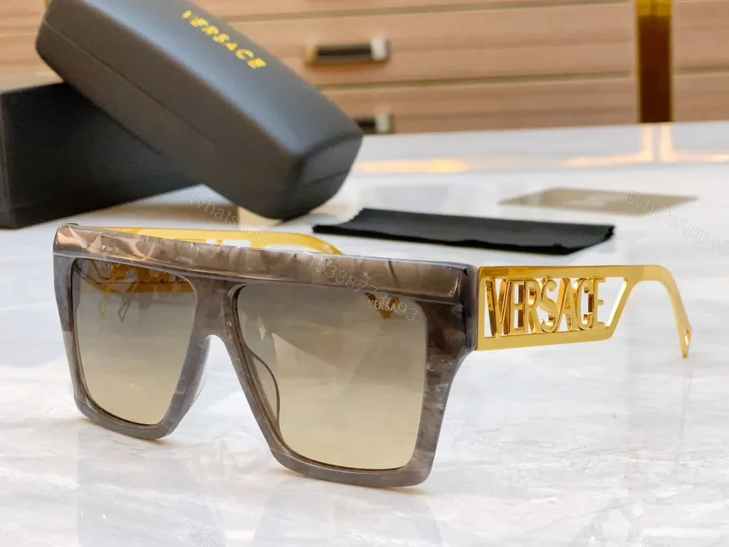 View 6 of Bold Black & Gold Luxe Sunglasses - Statement Frame, All-Day Comfort