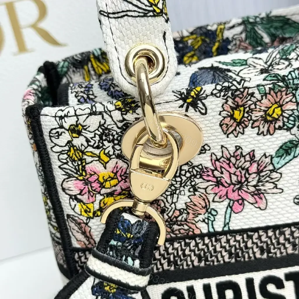View 10 of Floral Canvas Luxe Bag with Logo Detailing Handbag