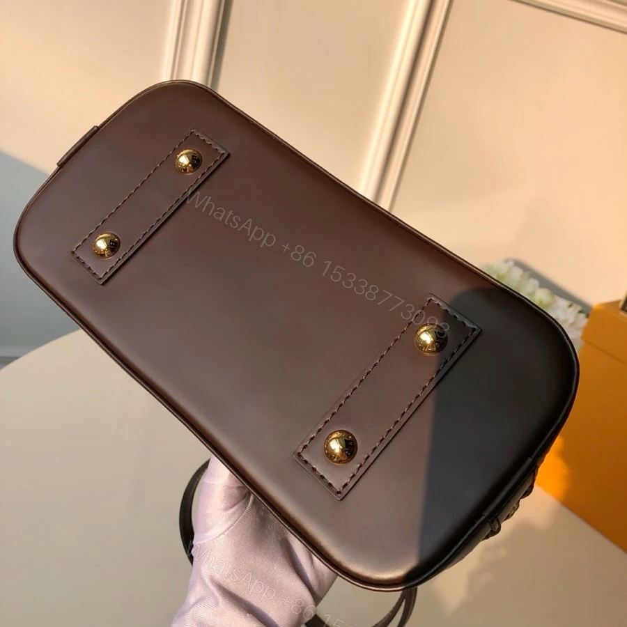 View 3 of Louis Vuitton Alma PM Damier Ebene Brown 32Cm N53151