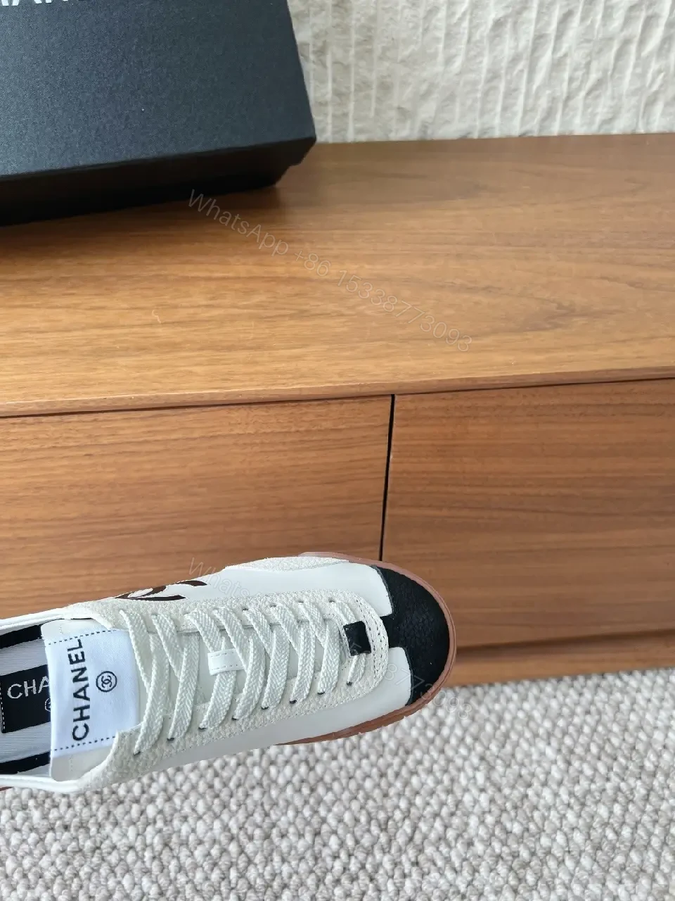 View 8 of Chic Monochrome Leather-Accent Luxury Sneaker, Low-Top