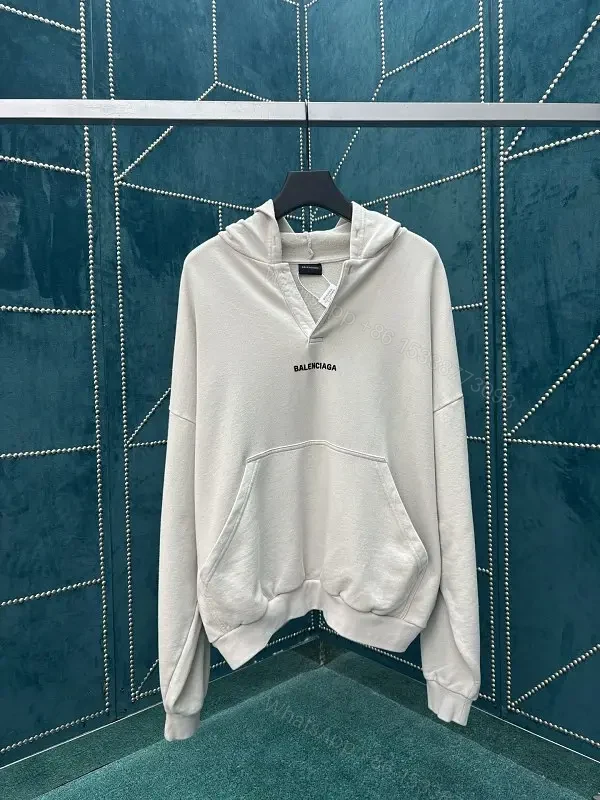 Neutral Cotton Blend Minimalist Hoodie with Subtle Logo (Unisex) — view 1