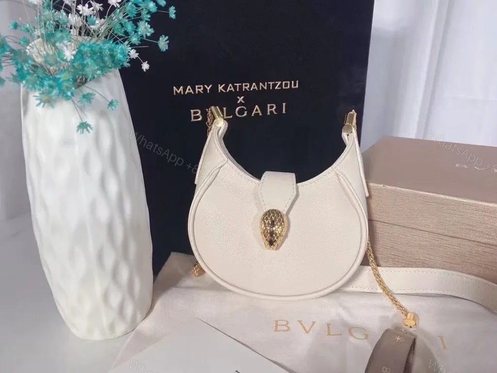Ivory Crescent Mini Bag â€” Day-to-Night Luxury, Sculpted Leather Bag — view 1