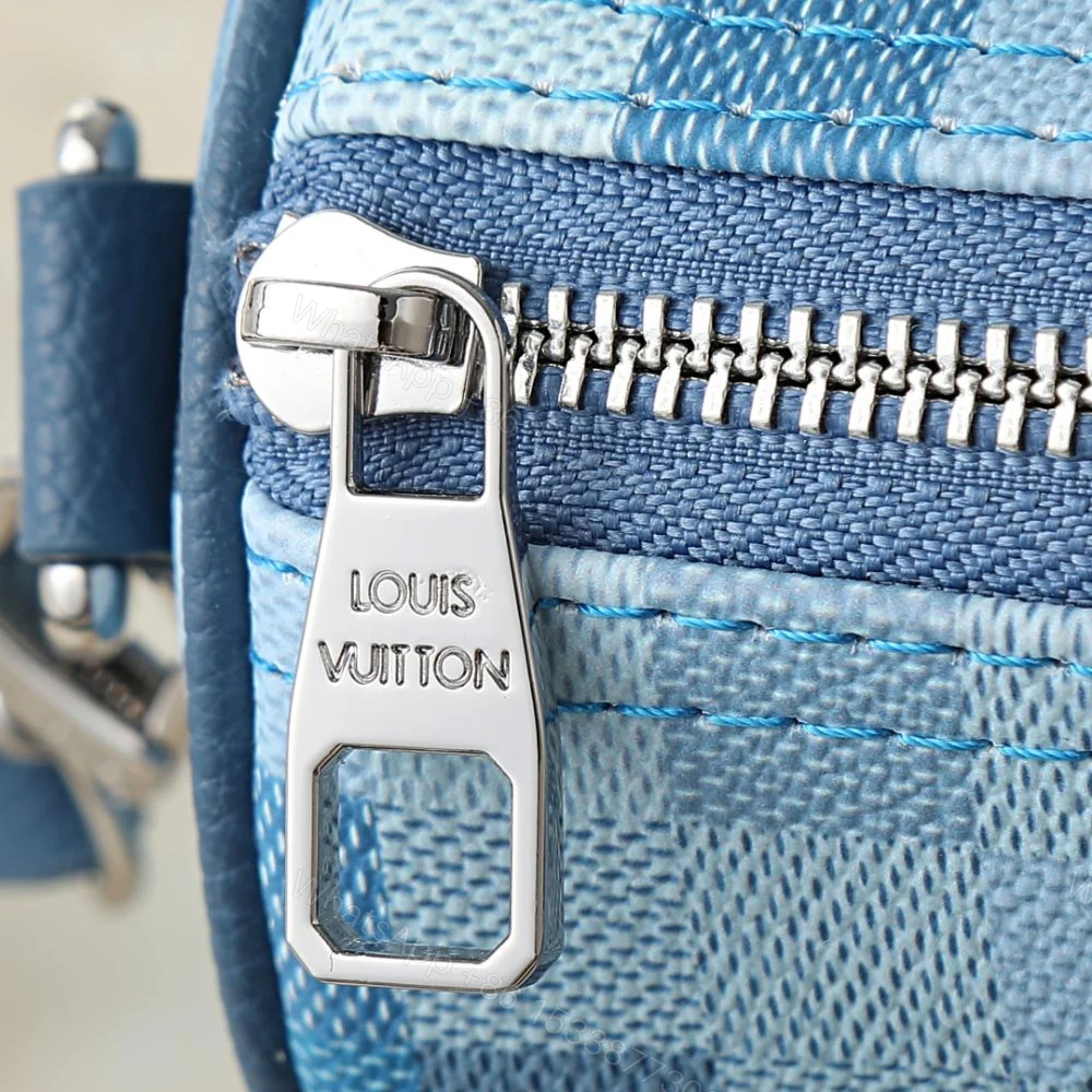 View 8 of Louis Vuitton Keepall Bandoulière 25 Blue 25Cm M28600