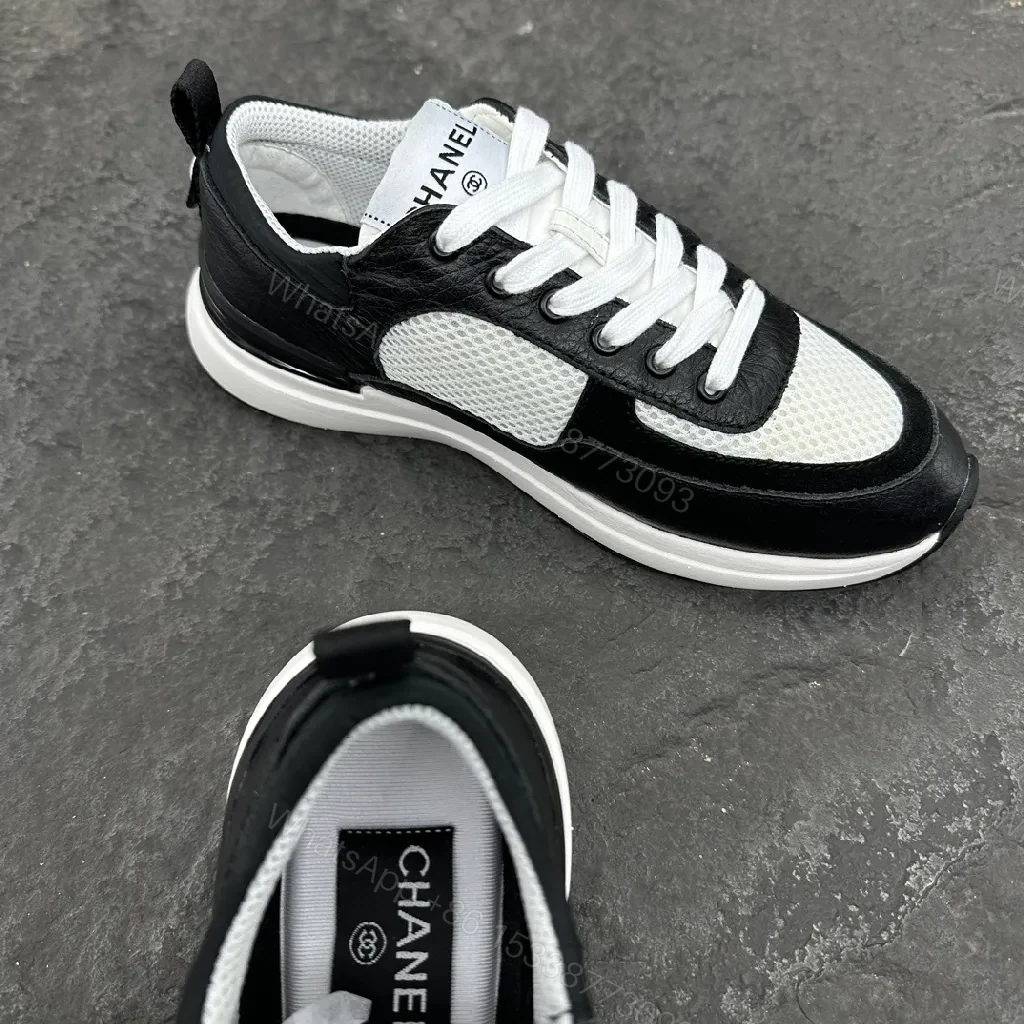 View 2 of Monochrome Leather-Textured High-Tops: Modern Luxury Sneakers