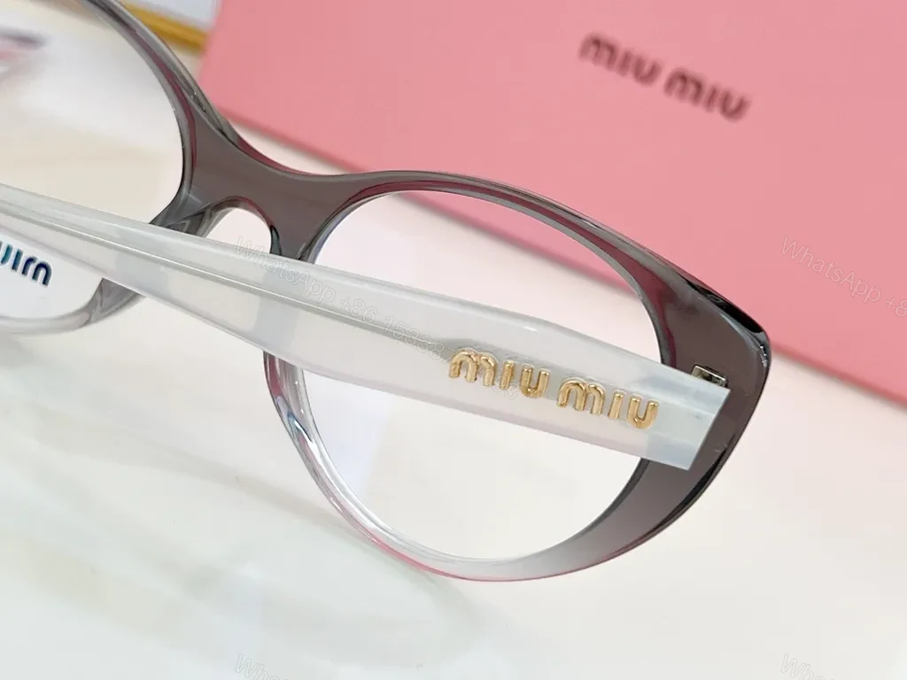 View 9 of Miu Miu Black Cat-Eye Eyewear: Everyday Luxury