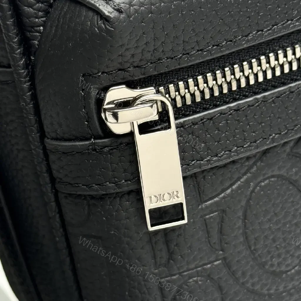 View 6 of Compact Leather Crossbody Bag - Embossed Texture, Luxury Minimalism