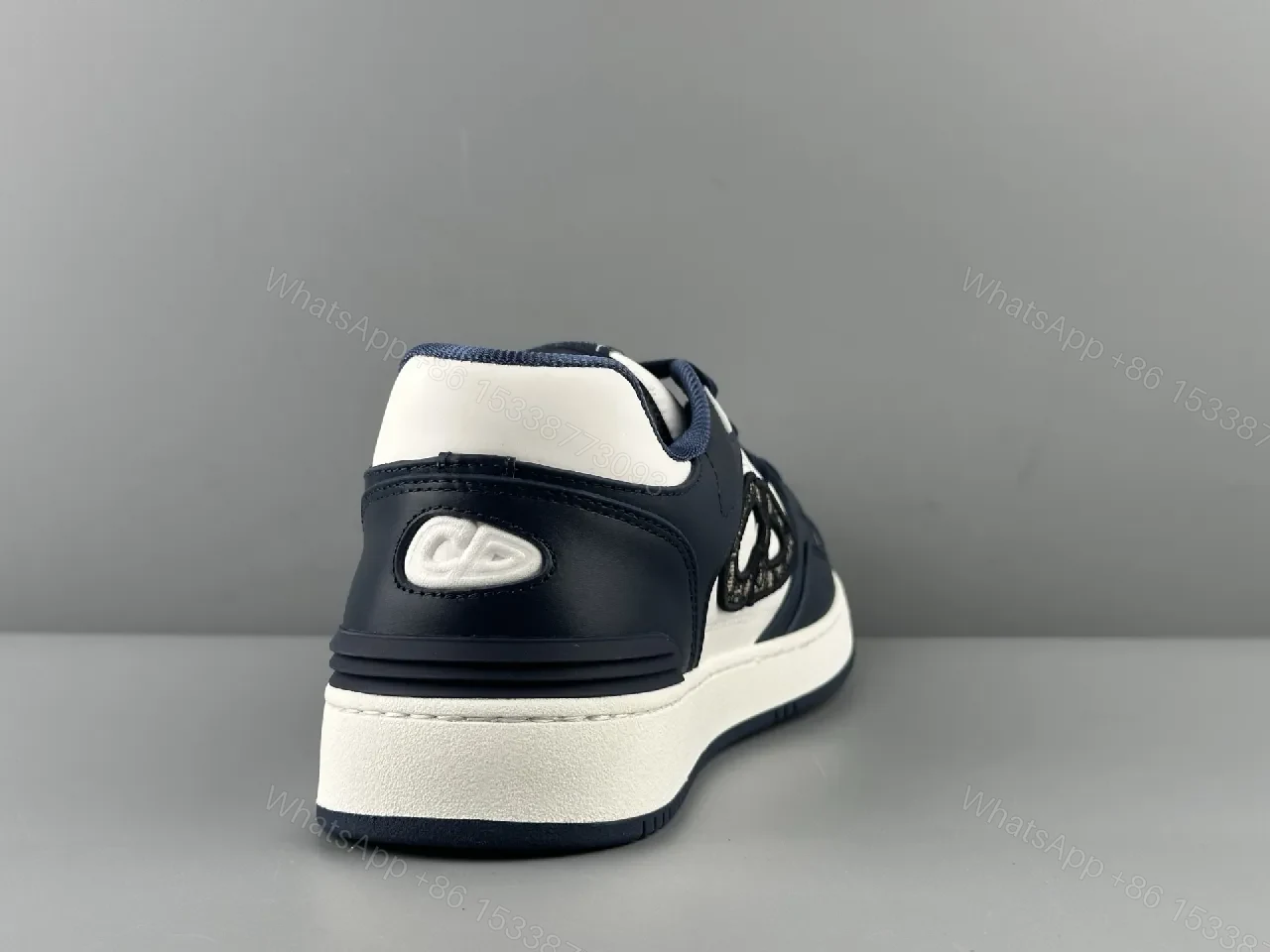 View 7 of Navy Leather High-Top Sneaker with Cutout Detailing