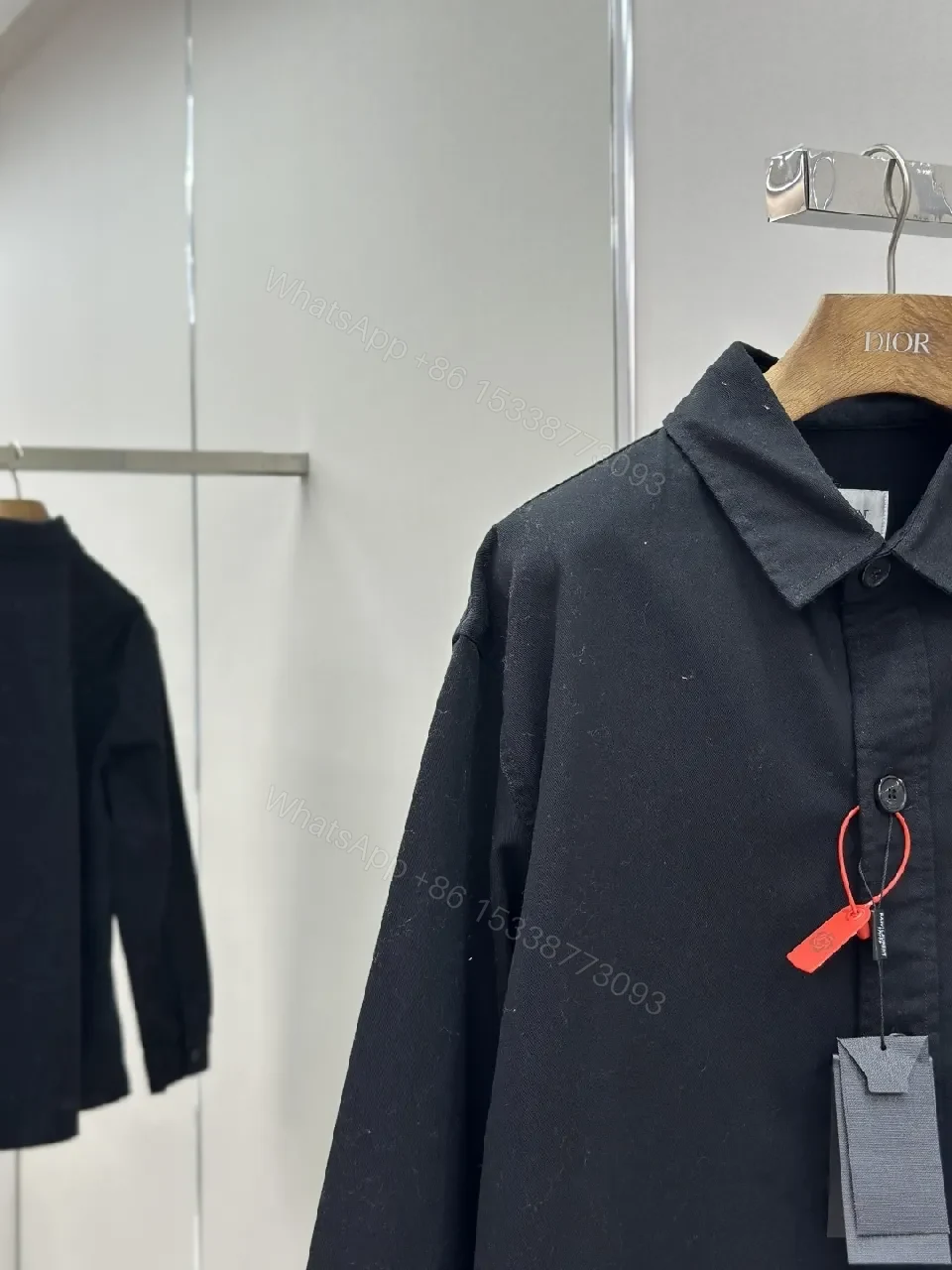 View 5 of Black Cotton-Blend Minimalist Shirt Jacket with Subtle Embroidery