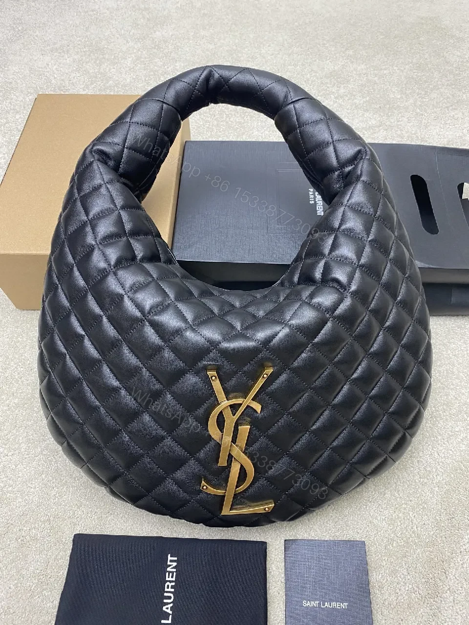 Quilted Leather Hobo Bag with Gold Hardware Emblem — view 1