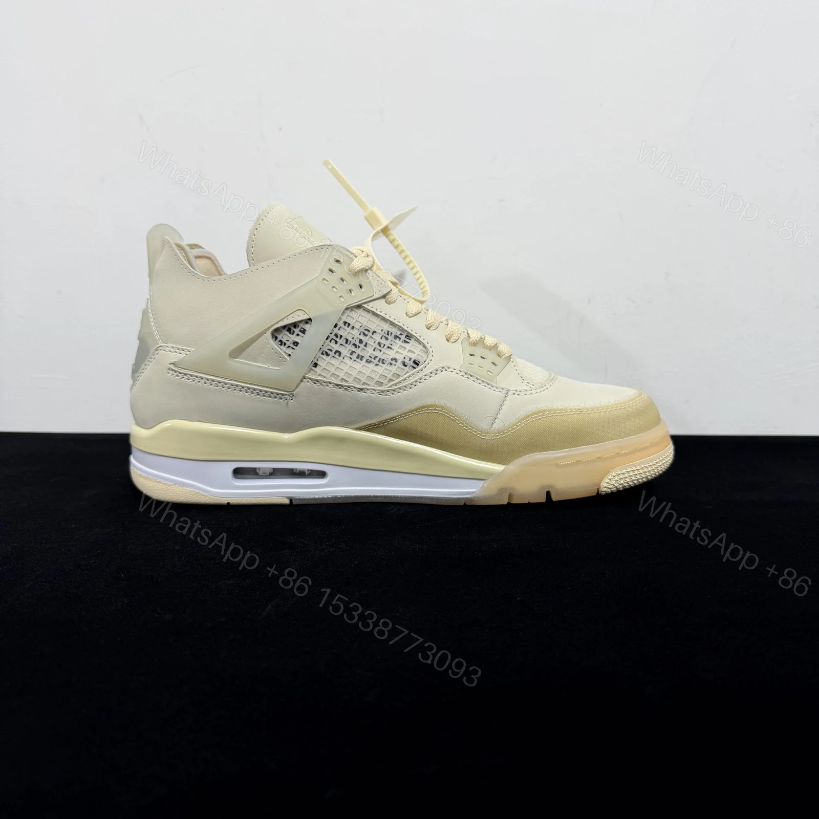 View 2 of Air Jordan 4 Retro Off-White Sail Reps