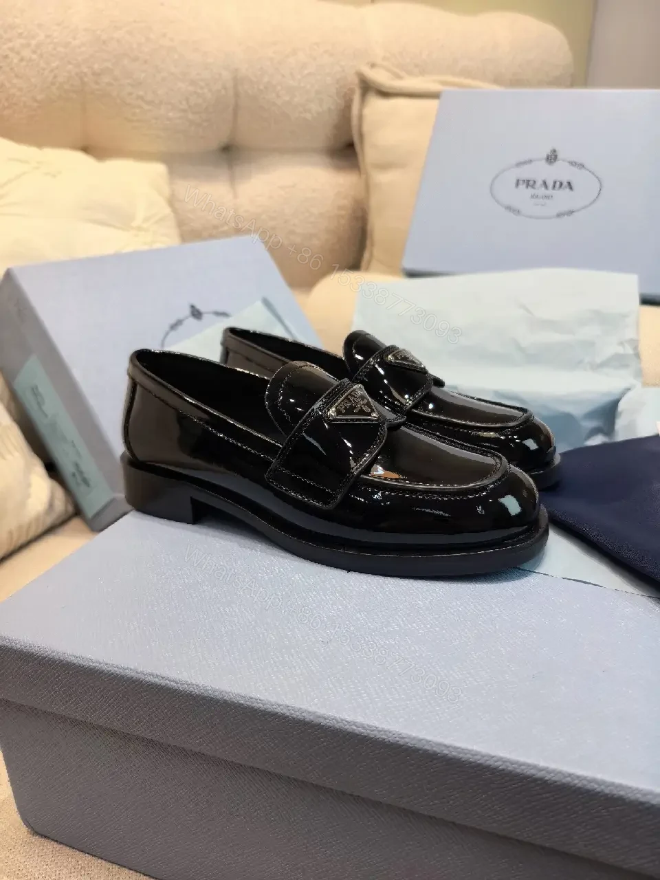 View 2 of Black Patent Leather Loafers Prada Style Feature: Logo Detail Shoe Type: Loafers
