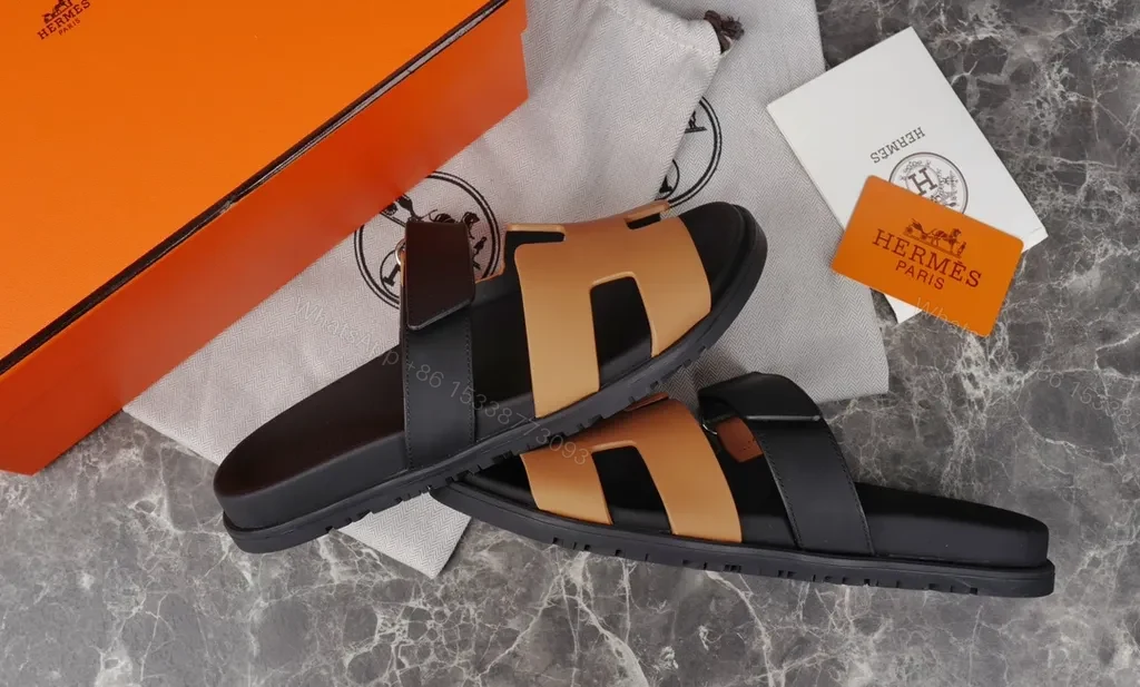 View 5 of Hermes Oran Leather Slides â€” H-Cutout, All-Day Comfort, Black/Tan