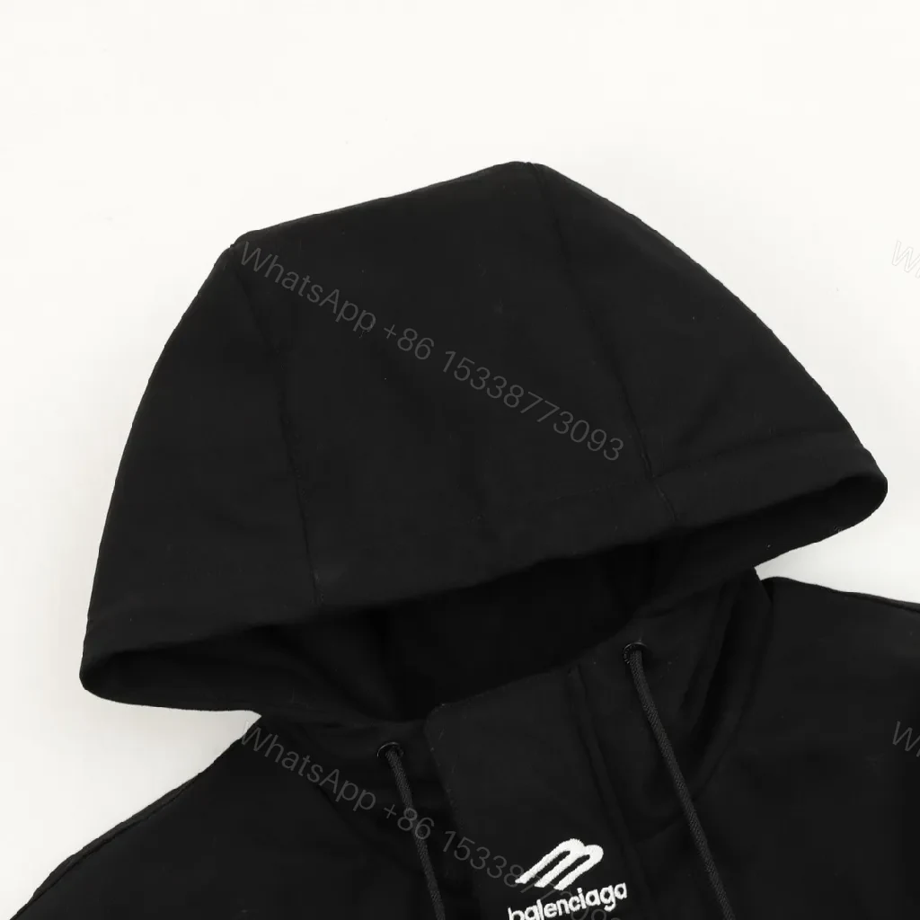 View 5 of Black Puffer Hoodie — Minimalist Luxury, Water-Repellent, Zip Pockets