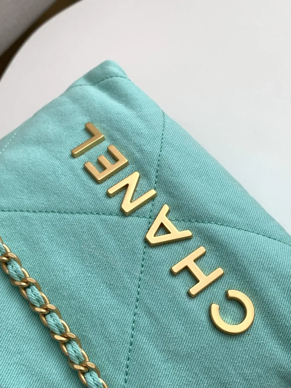 View 9 of Mint Quilted Bag with Gold Chain - Compact Luxury Carry