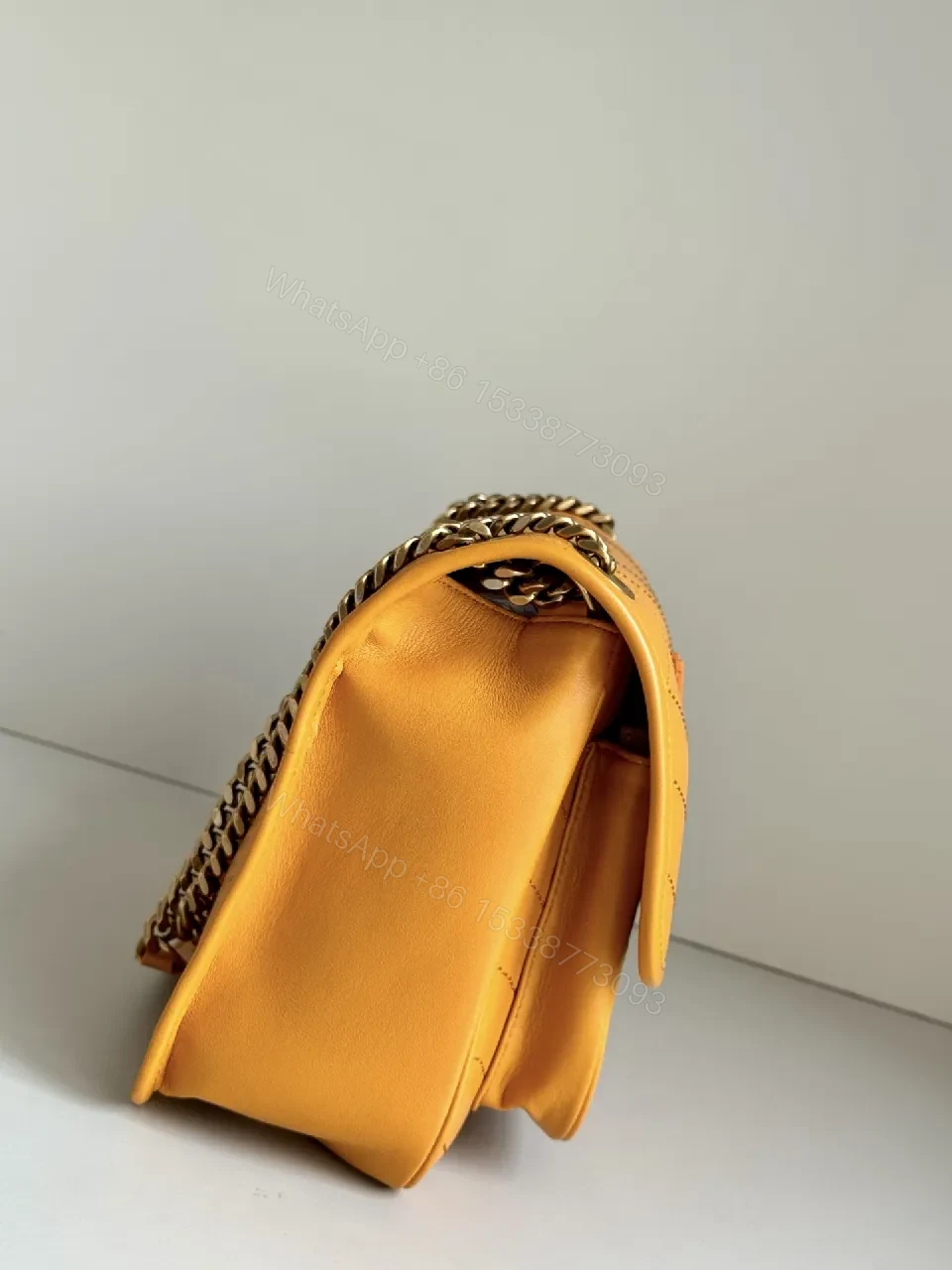 View 5 of Mustard Quilted Leather Crossbody with Chain Strap