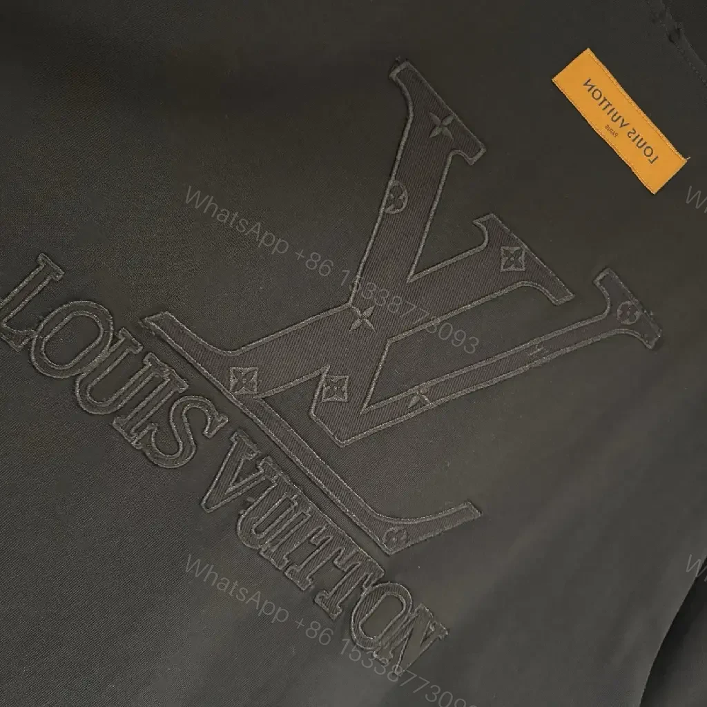 View 9 of Oversized Cotton Tee with Subtle Embroidery, Minimalist Luxe + Black