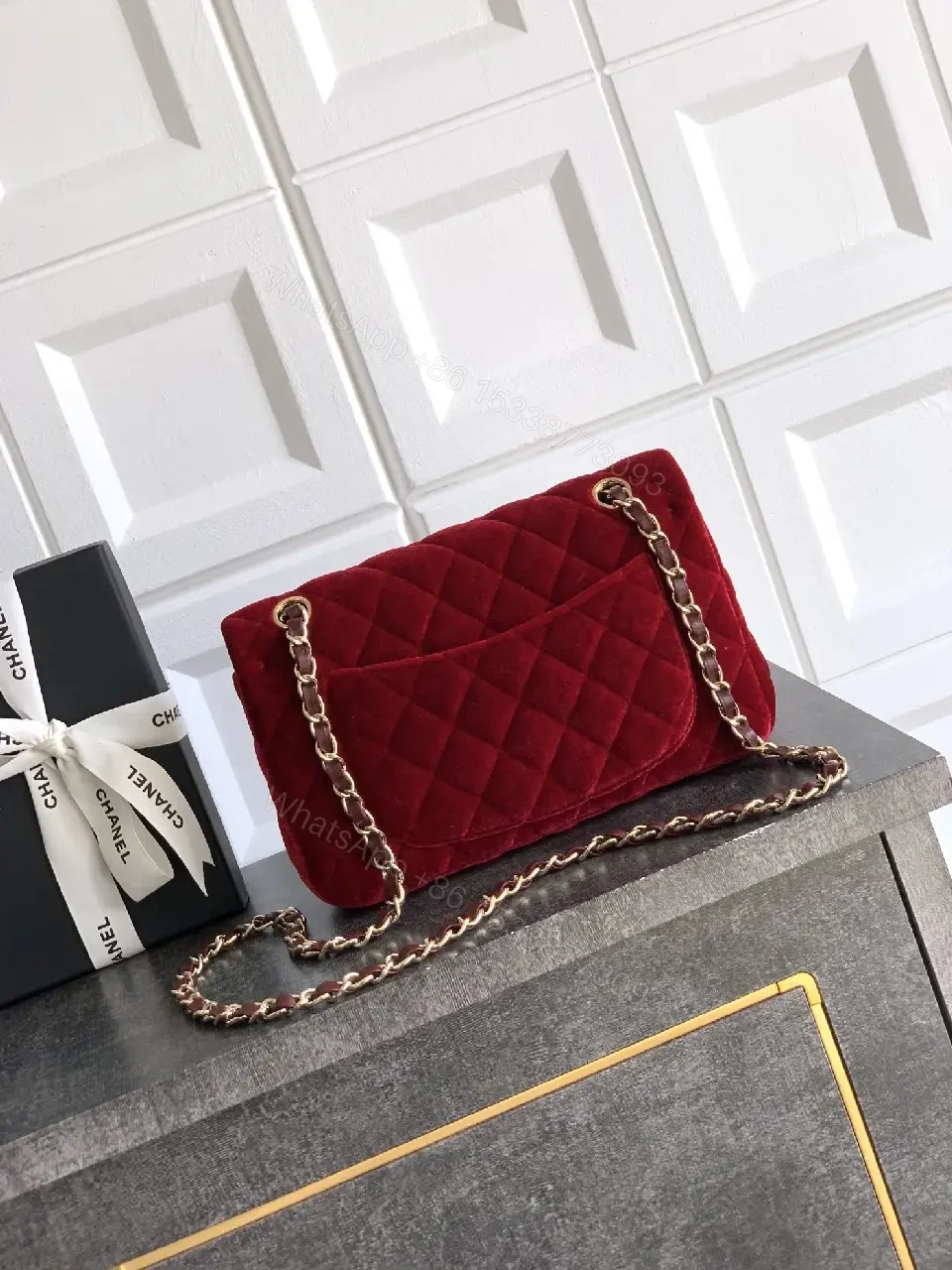 View 8 of Rich Velvet Red Flap Bag with Gold Chain Embellishment