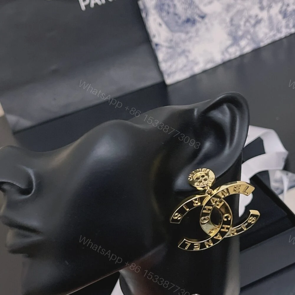 View 2 of Chanel Paris Button Earrings