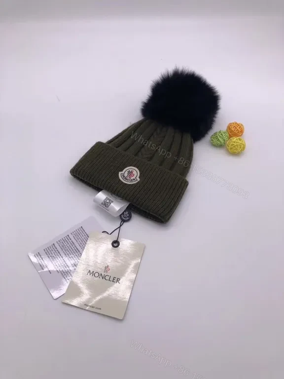 View 9 of Chic Black Moncler Knit Beanie â€” Plush Pom, Luxe Warmth