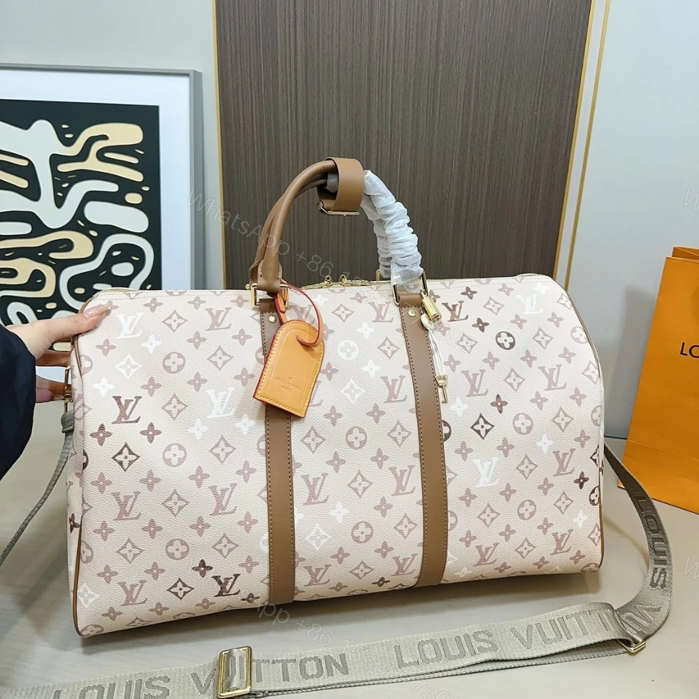 View 2 of Louis Vuitton Keepall Bandoulière 50 Monogram Beige 50Cm