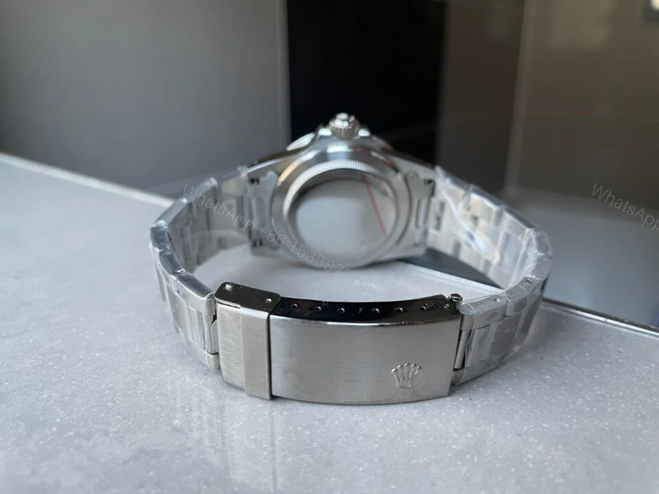 View 10 of VINTAGE Rolex Submariner Date Tiffany & Co 16610A30B9315 Black dial with SS bracelet