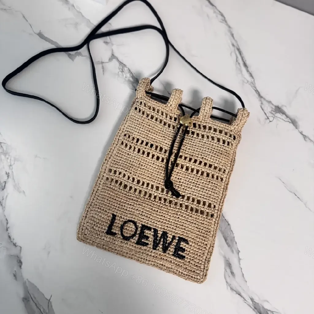 View 3 of Beige Straw Crochet Bag with LOEWE Logo Drawstring Tote