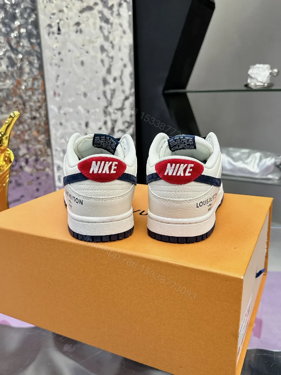 View 5 of White Leather Navy Accented Low-Top Sneakers: Premium Comfort, Subtle LV-Inspired Detailing