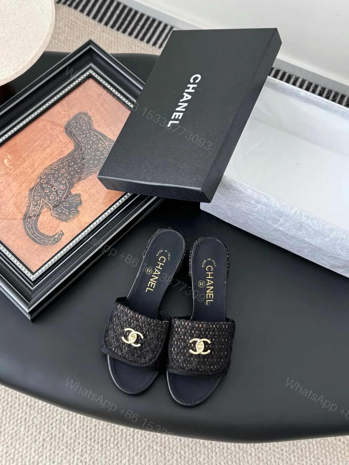 Chanel Women Black Woven Leather Slides — view 1