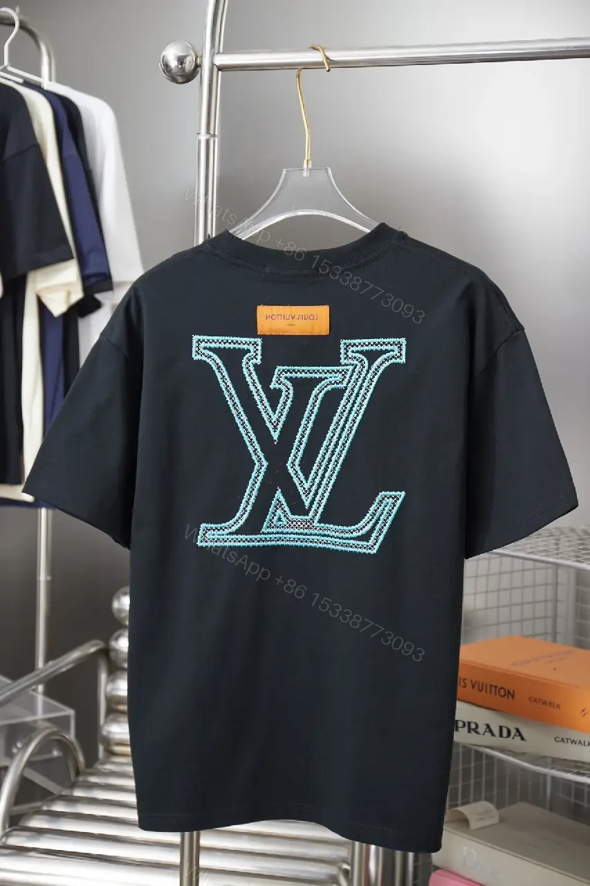 View 7 of Black Cotton Tee with Teal Embroidered Logo Accent, Minimalist Style, Everyday Luxury Tee