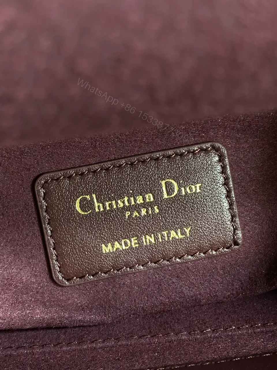 View 7 of Quilted Burgundy Handbag with Top Handles, Structured Charm