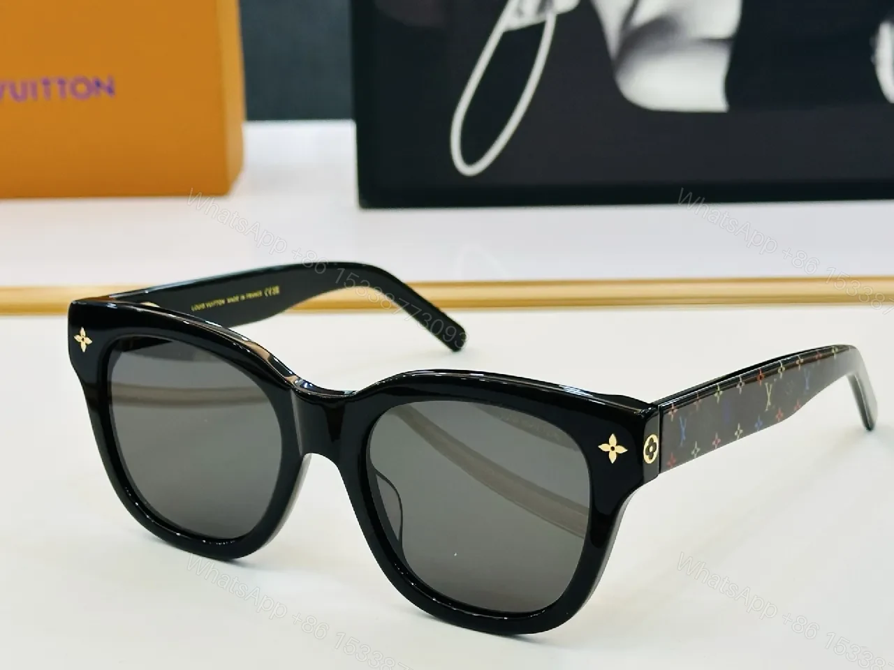 View 2 of Bold Black Frame Sunglasses with Luxe Monogram Detailing